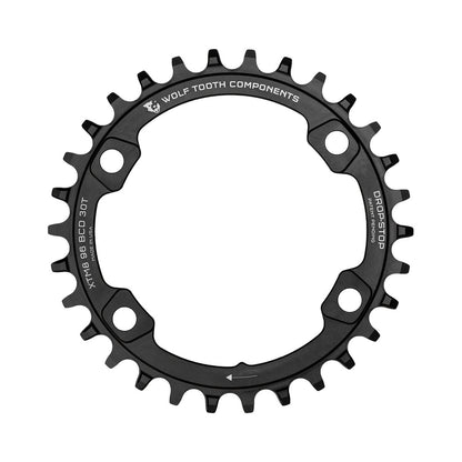 Einfach-Kettenblatt WOLF TOOTH 96 BCD 11-fach Shimano XT M8000/SLX M7000, 4-Loch, 96 mm, Schwarz — Kettenblatt auf weißem Hintergrund
