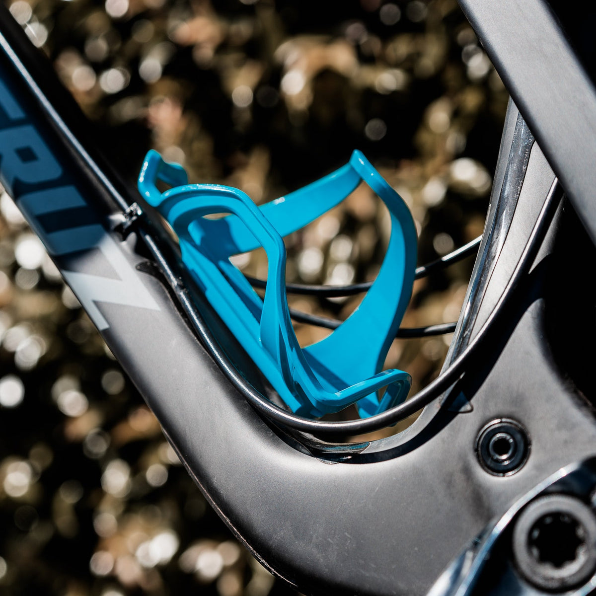 LEZYNE FLOW CAGE SL-R Flaschenhalter mit Entnahme nach rechts, Matt-Tan