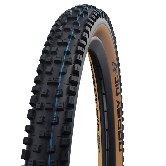 SCHWALBE NOBBY NIC-Reifen 27.5x2.40 ADDIX SPEEDGRIP SUPERGROUND Snakeskin Tubeless Ready Weich Schwarz/Braun